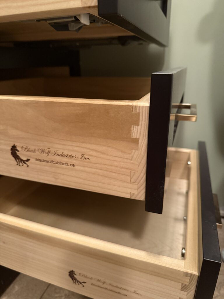 close up picture of poplar drawer box, showcasing dovetail joinery.