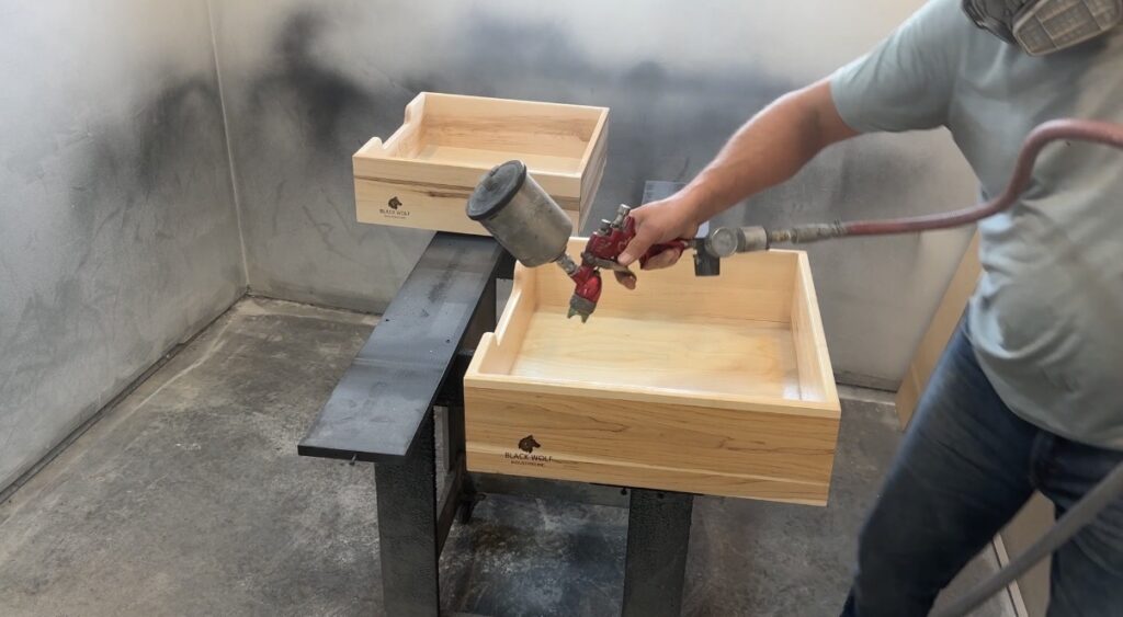 spraying finish on drawer boxes