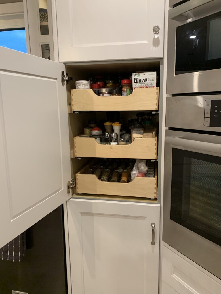Drawer boxes pullouts in pantry.